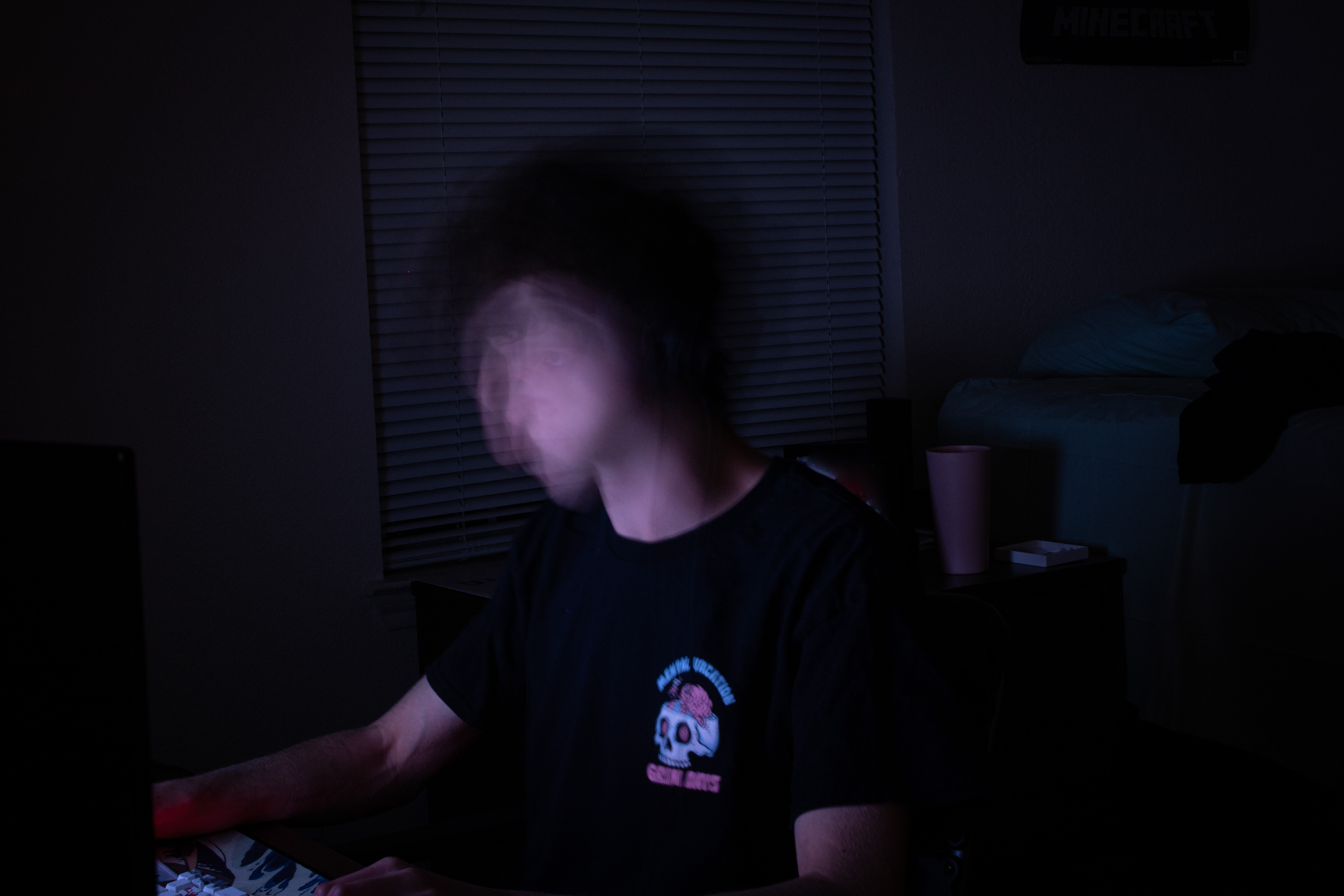 Person at computer at night