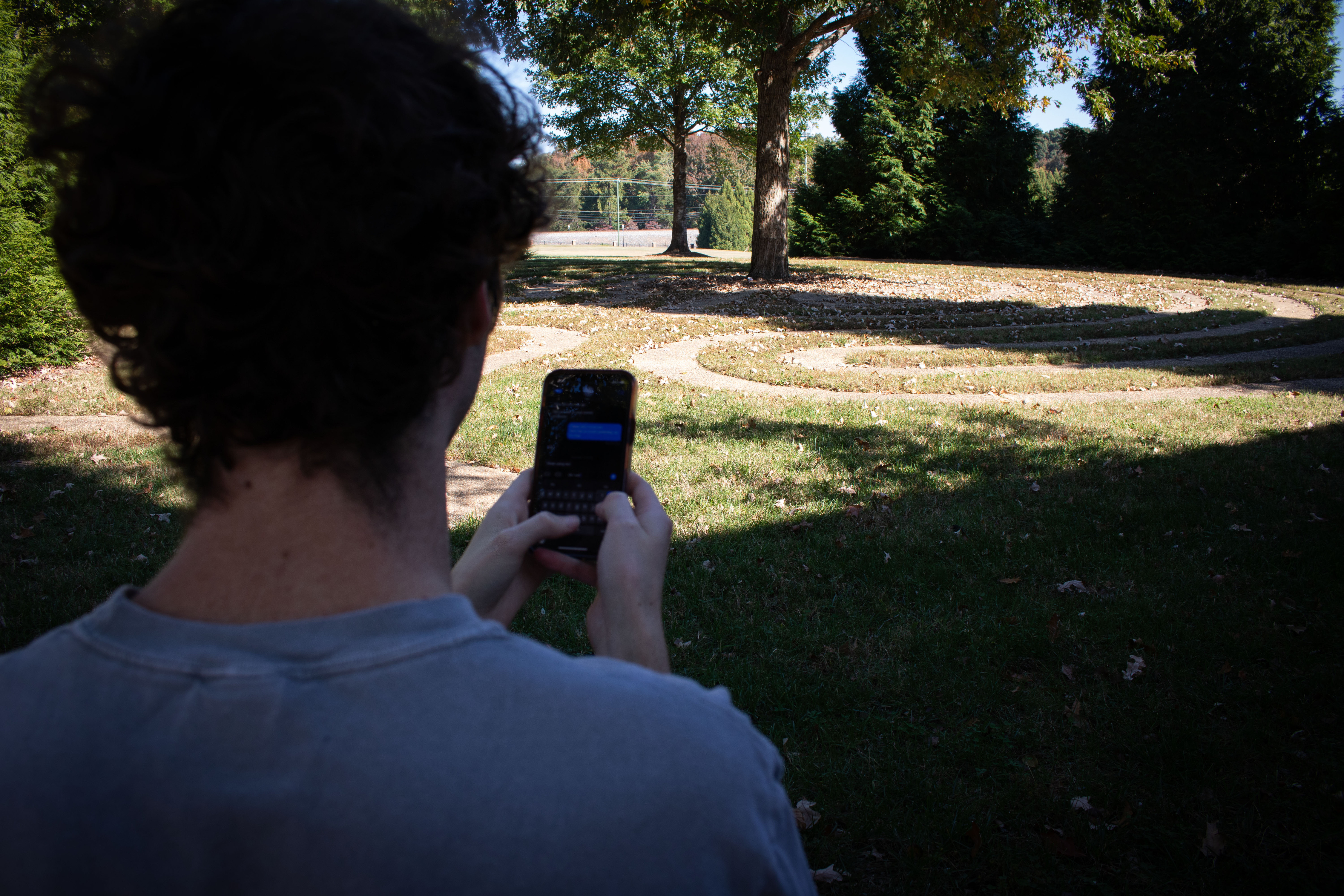Person on phone outdoors