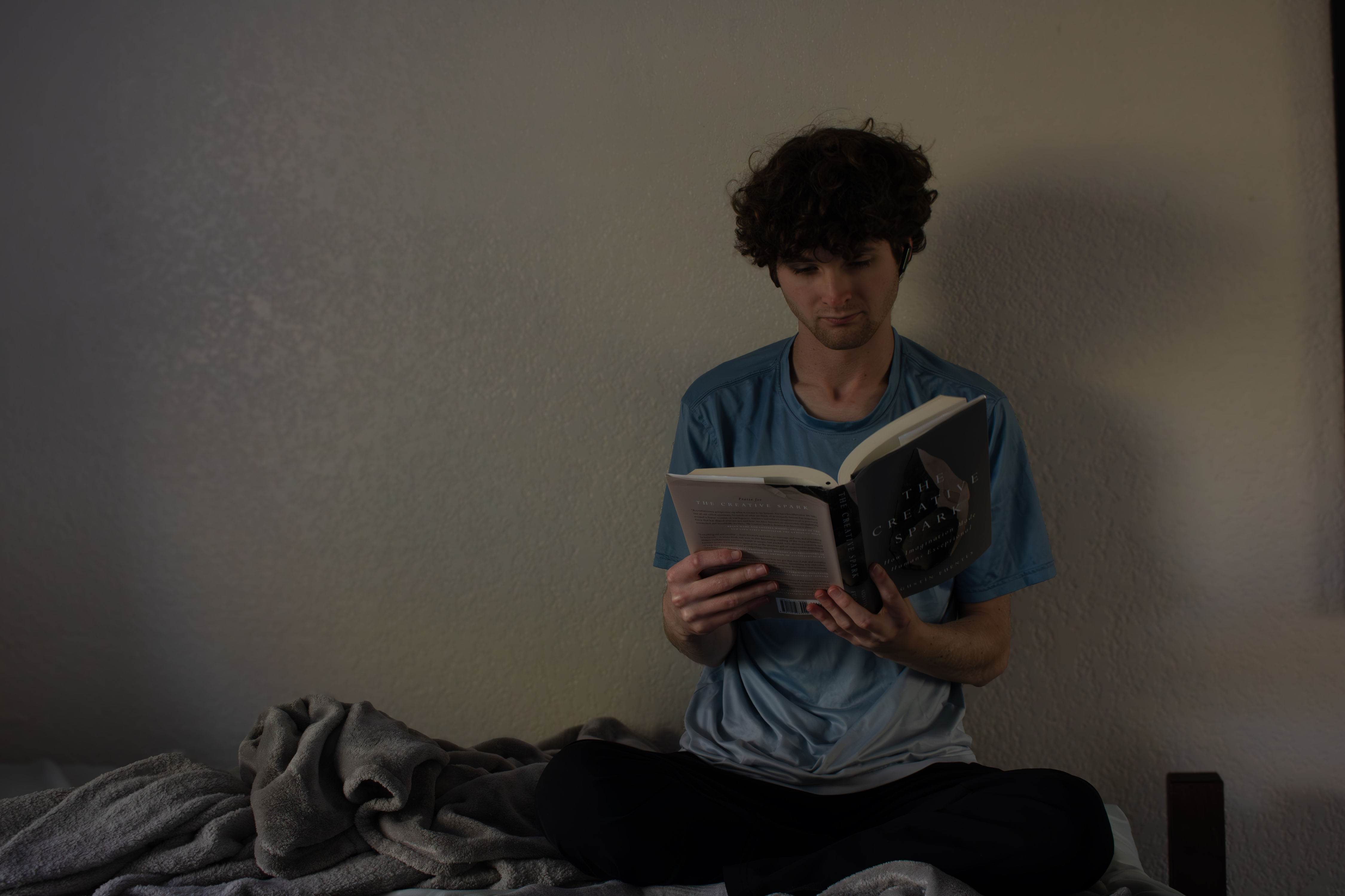 Person reading in bed